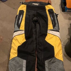 Size M - Castle X snowmobile riding pants.